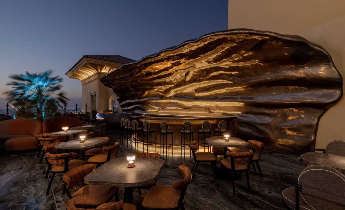 Sculptural illuminated canopy above the Mercury Lounge bar at Four Seasons Resort Jumeirah Beach
